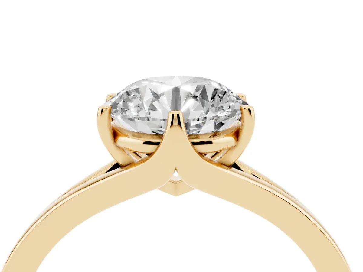 Round Cut Solitaire Diamond Ring with Six-Prong Setting and Tapered Band Yellow gold
