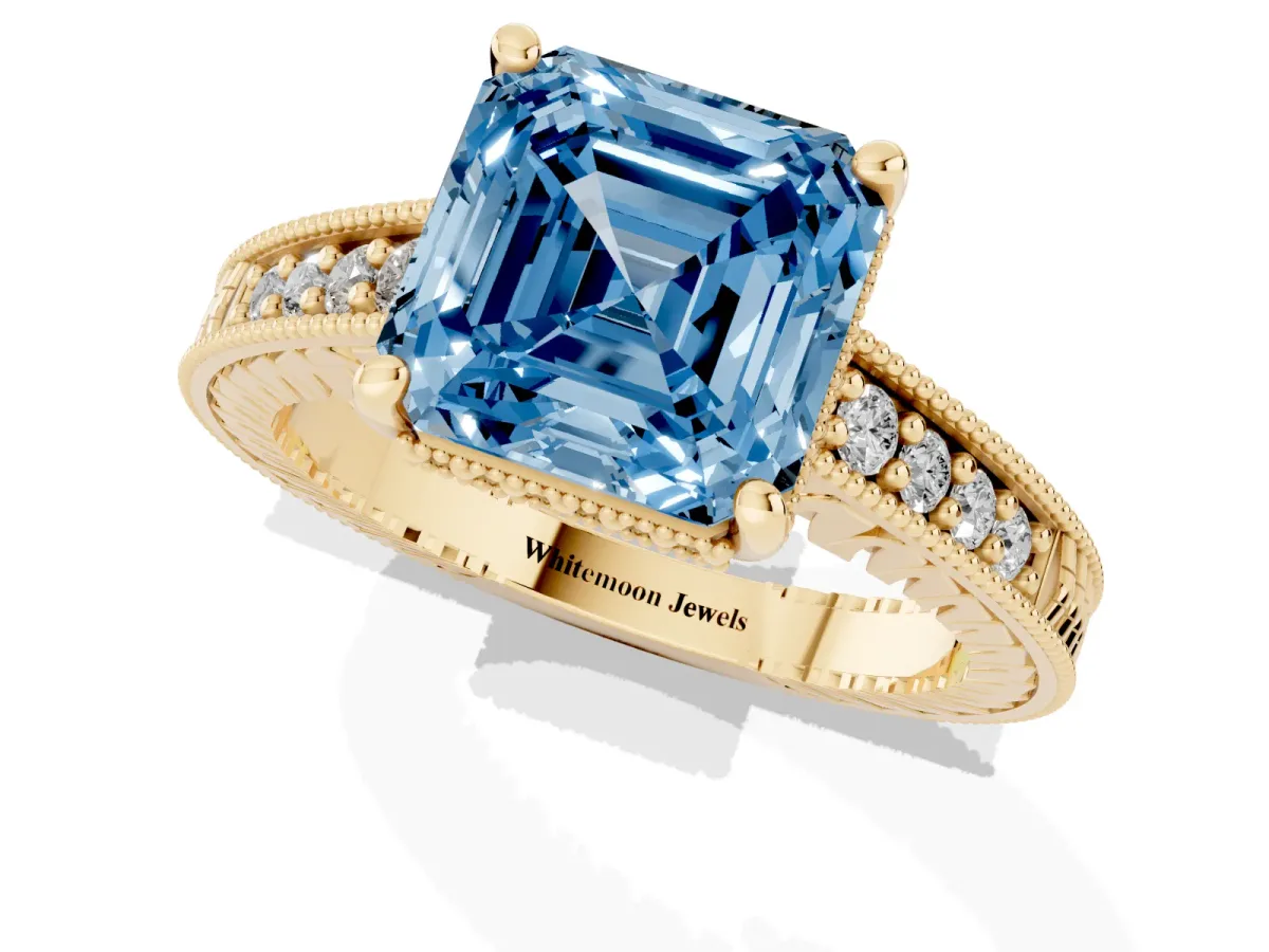 Fancy Blue Asscher Cut Solitaire Pavé Diamond Milgrain Engagement Ring with Four-Prong Setting Yellow gold