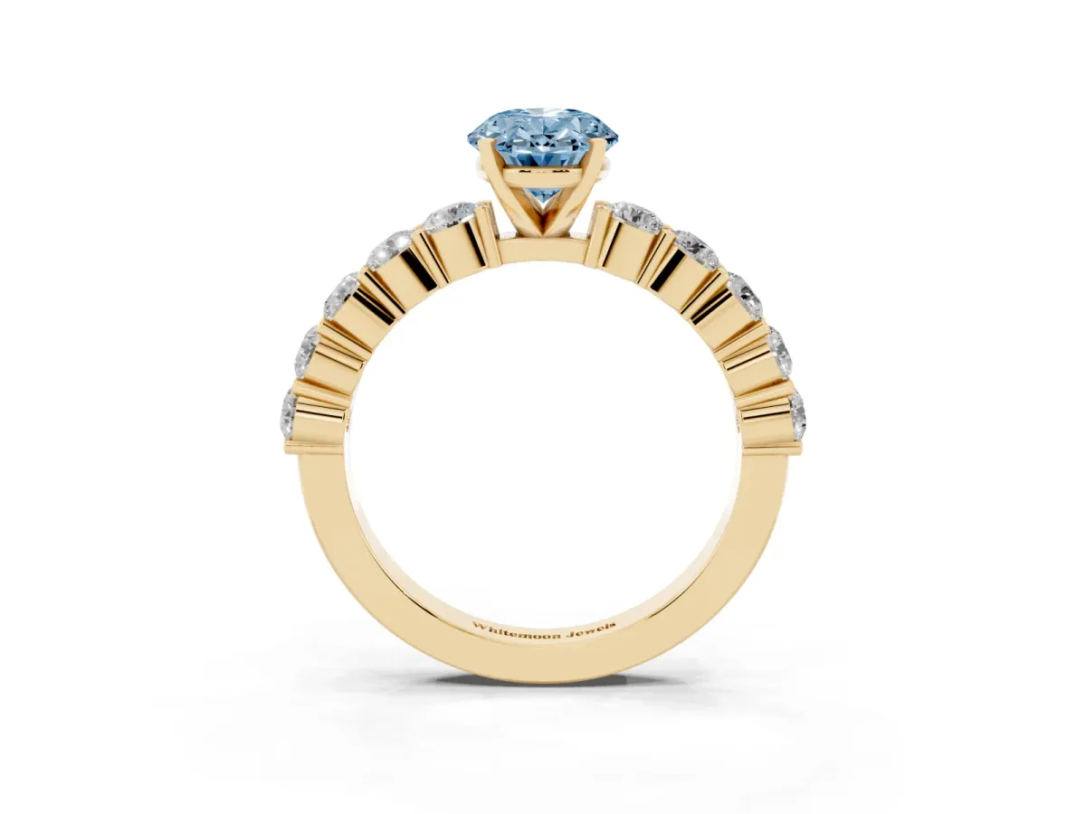 Fancy Blue Oval Cut Diamond Solitaire Ring with Shared Prong Round Side Stones Yellow gold