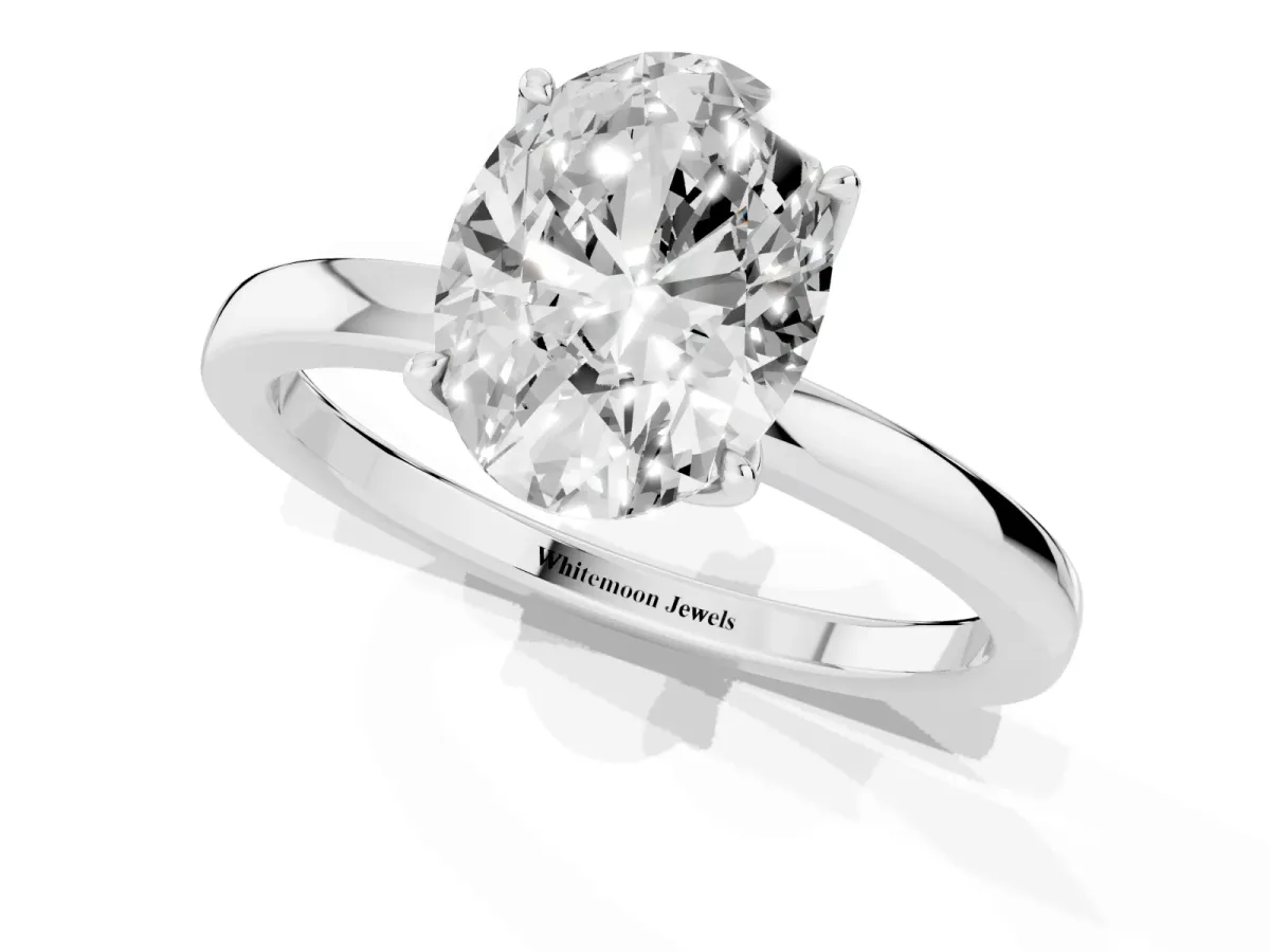 Oval Cut Diamond Solitaire Ring with Thin Band and Prong Setting Silver