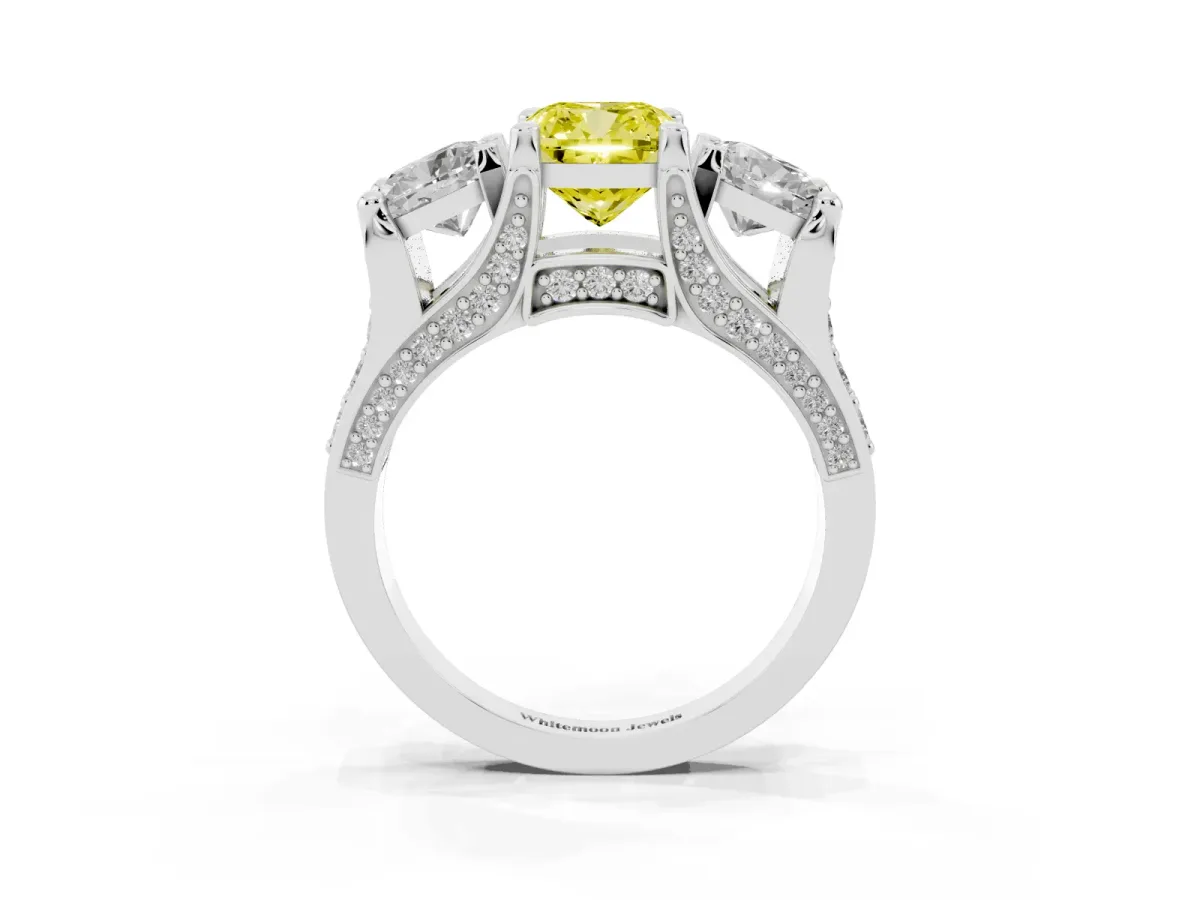 Fancy Yellow Cushion Cut Diamond Three-Stone Ring with Channel Set Band and Four-Prong Setting Silver