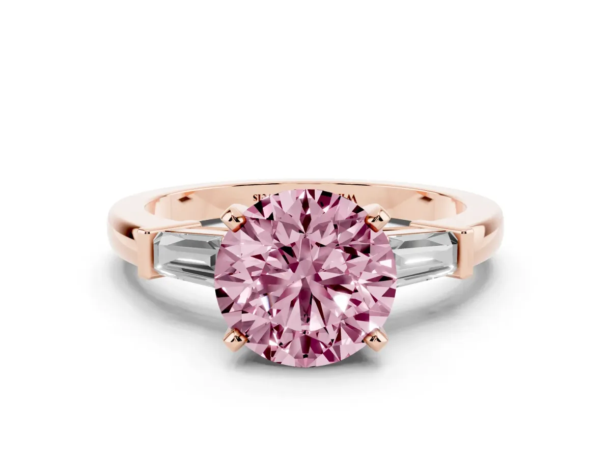 Fancy Pink Round Cut Cut Diamond Solitaire Ring with Tapered Baguette Accents and Four-Prong Setting Rose gold