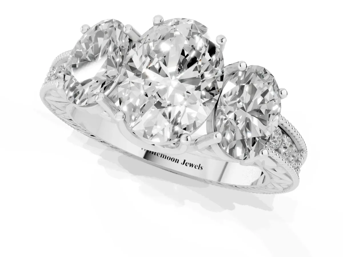 Three-Stone Oval Cut Cut Milgrain Pavé Engagement Ring White gold
