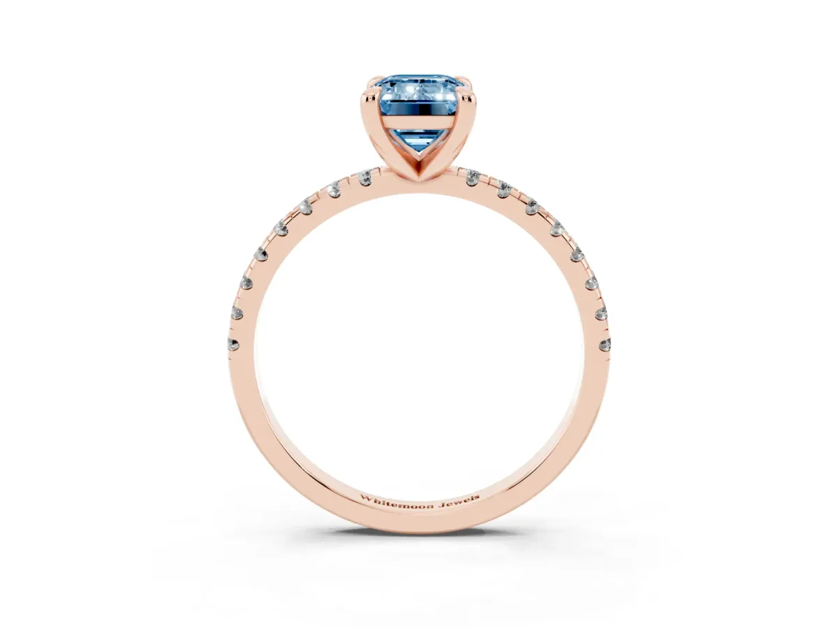 Fancy Blue Emerald Cut Diamond Brilliant Solitaire Ring with Pavé Band and Four-Prong Setting Rose gold