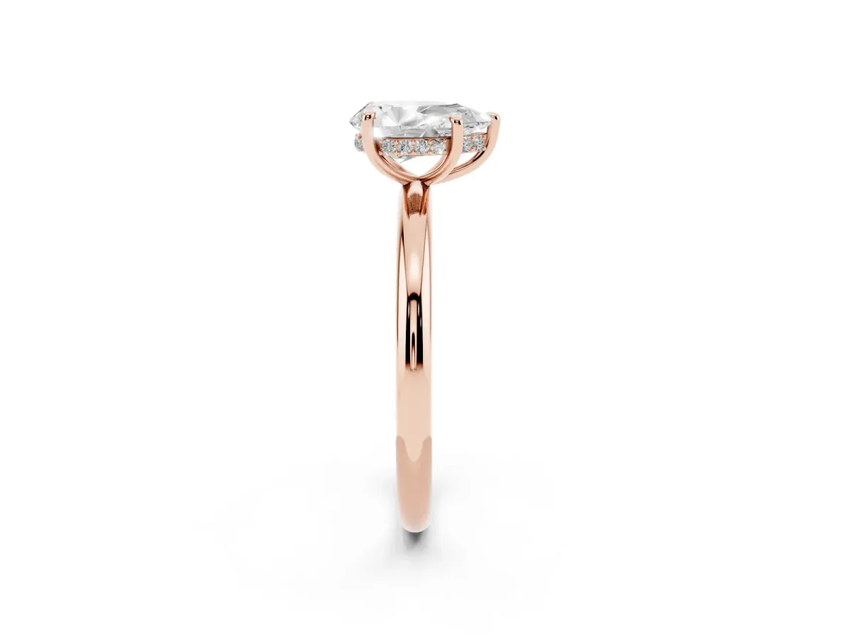 Pear Cut Diamond Solitaire Ring with Thin Band and Four-Prong Setting Rose gold