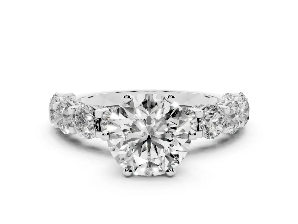 Round Cut Diamond Side Stone Engagement Ring with Four-Prong Setting Silver
