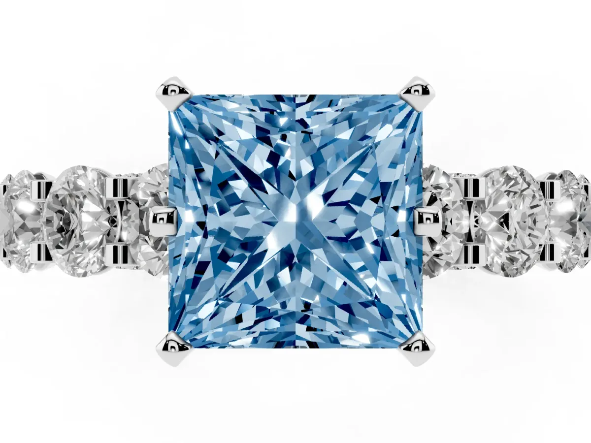 Fancy Blue Princess Cut Diamond Side Stone Engagement Ring with Four-Prong Setting Platinum