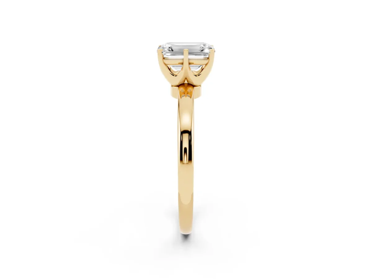 Emerald Cut Solitaire Diamond Ring with Six-Prong Setting on a Classic Band Yellow gold