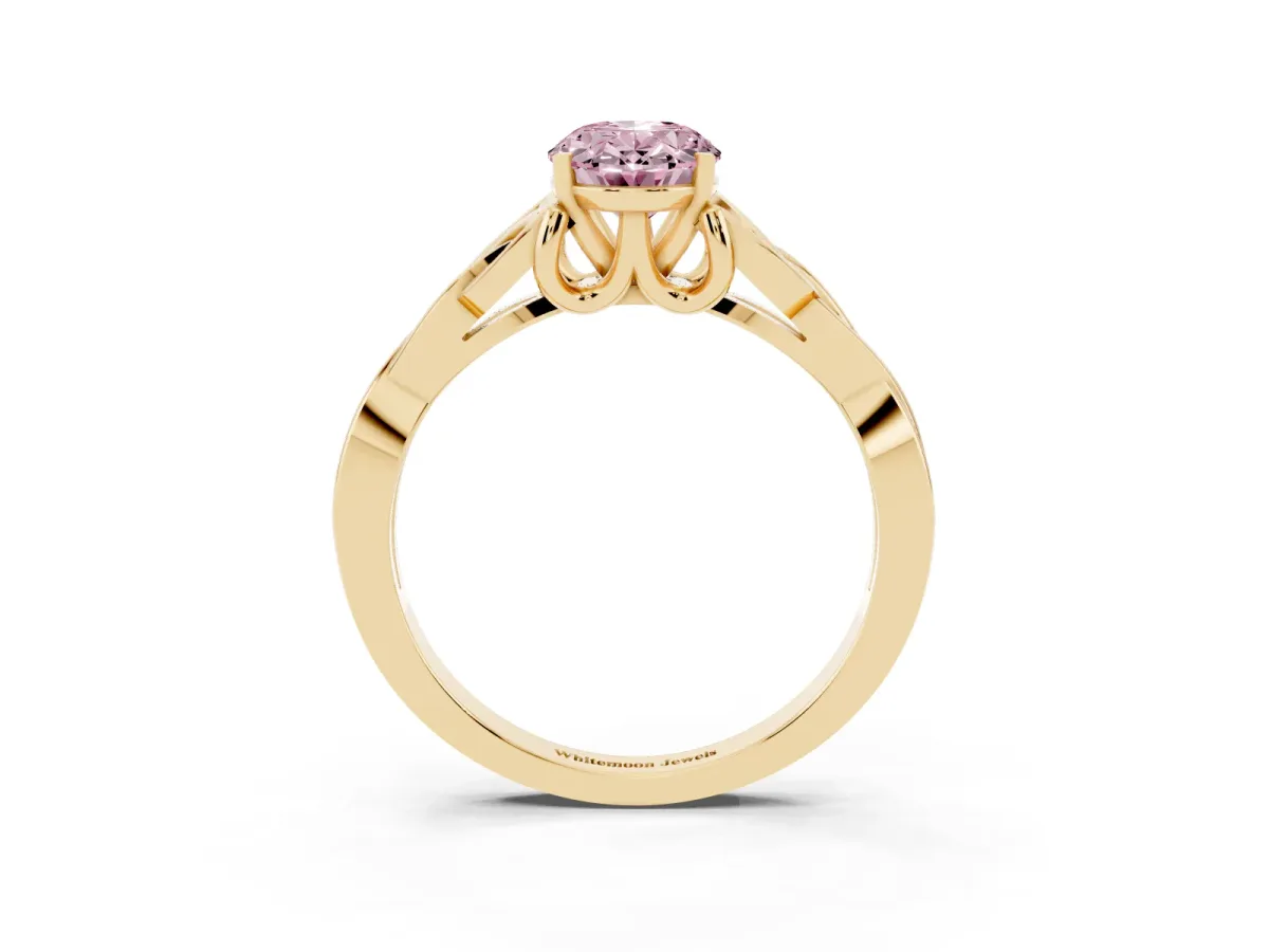 Fancy Pink Oval Cut Diamond Solitaire Engagement Ring with Celtic Knot Band and Four-Prong Setting Yellow gold