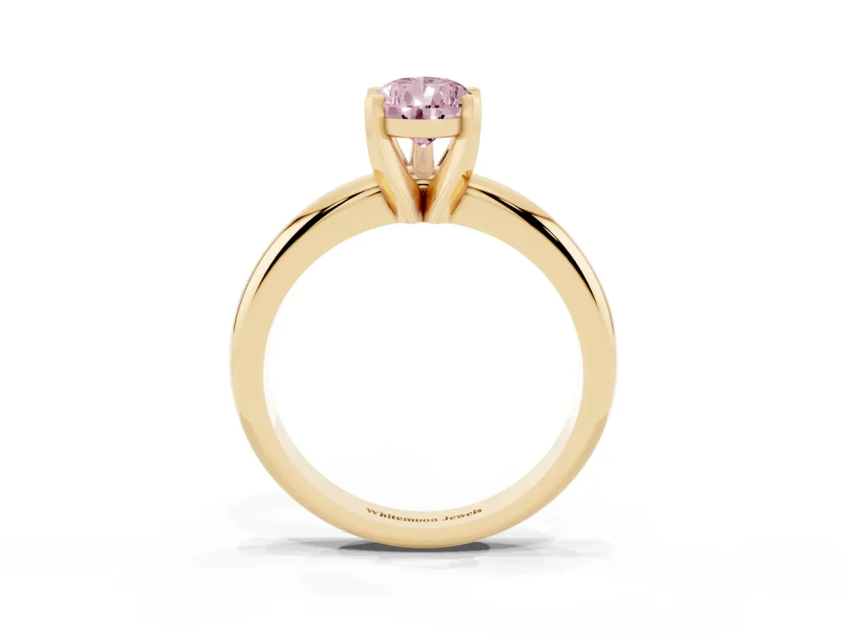 Fancy Pink Pear Cut Diamond Solitaire Engagement Ring with Round Band and Four-Prong Setting Yellow gold