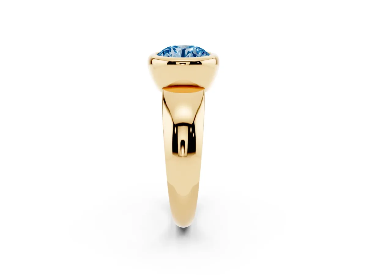 Fancy Blue Bezel Set Round Cut Solitaire Ring with Wide Band Yellow gold