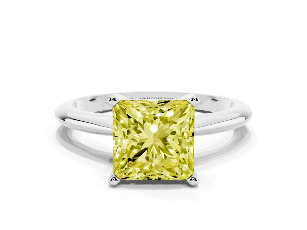 Fancy Yellow Princess Cut Cut Solitaire Ring with Four-Prong Setting on a Classic Band Silver