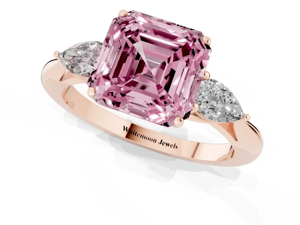 Fancy Pink Three-Stone Asscher Cut Diamond Ring with Pear Side Stones in Four-Prong Setting Rose gold