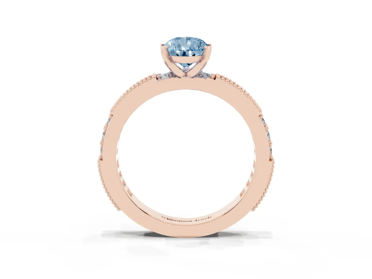 Fancy Blue Pear Cut Solitaire with Pavé Band and Four-Prong Setting Rose gold