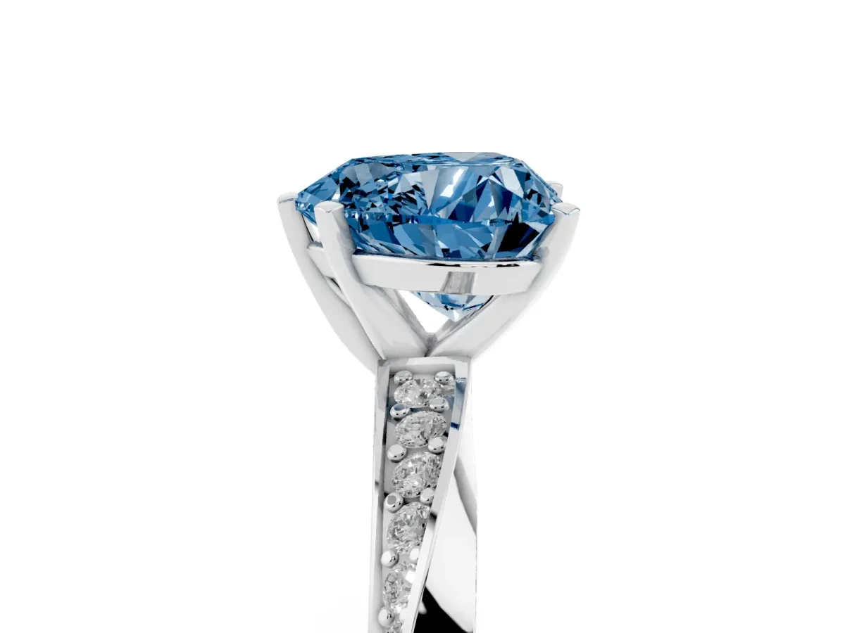 Fancy Blue Heart Cut Diamond Engagement Ring with Side Stone Accents and Four-Prong Setting Silver