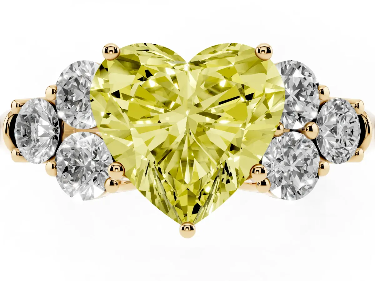 Fancy Yellow Heart Cut Cut Diamond Cluster Ring with Round Accent Stones and Prong Setting on a Classic Band Yellow gold