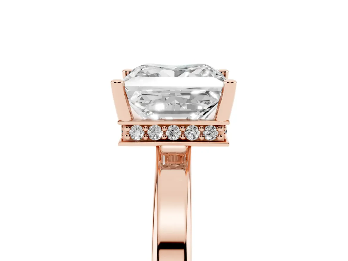 Princess Cut Cut Solitaire Engagement Ring with Four-Prong Setting on a Classic Band Rose gold