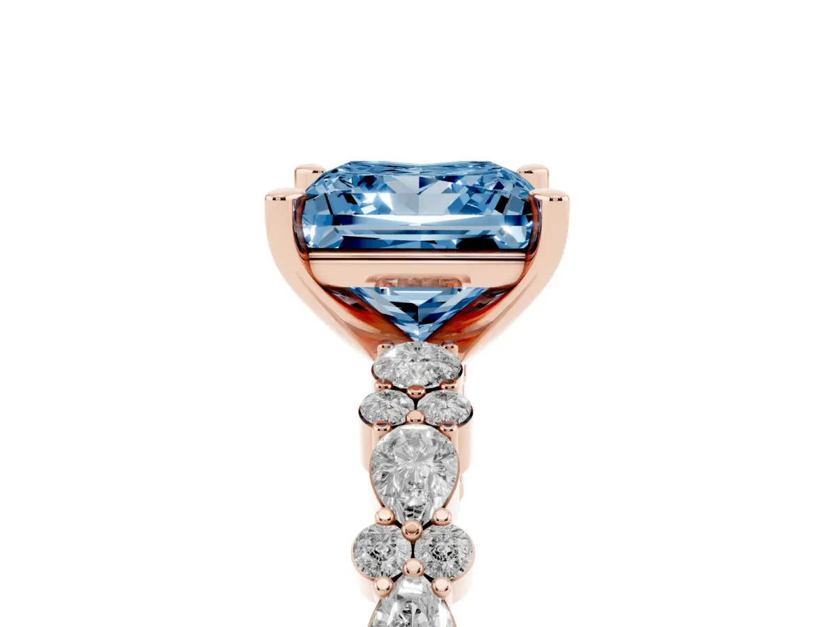 Fancy Blue Princess Cut Diamond Side Stone Solitaire Ring with Round and Four-Prong Setting Rose gold