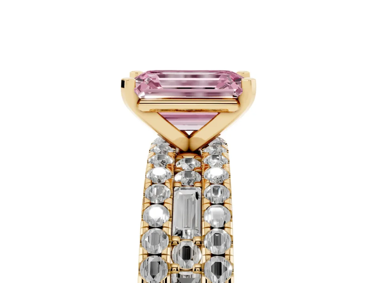 Fancy Pink Emerald Cut Diamond Solitaire Ring with Pavé and Channel Set Band Yellow gold