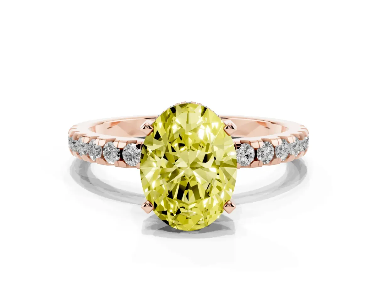 Fancy Yellow Oval Cut Diamond Solitaire Ring with Round Pavé Band and Four-Prong Setting Rose gold