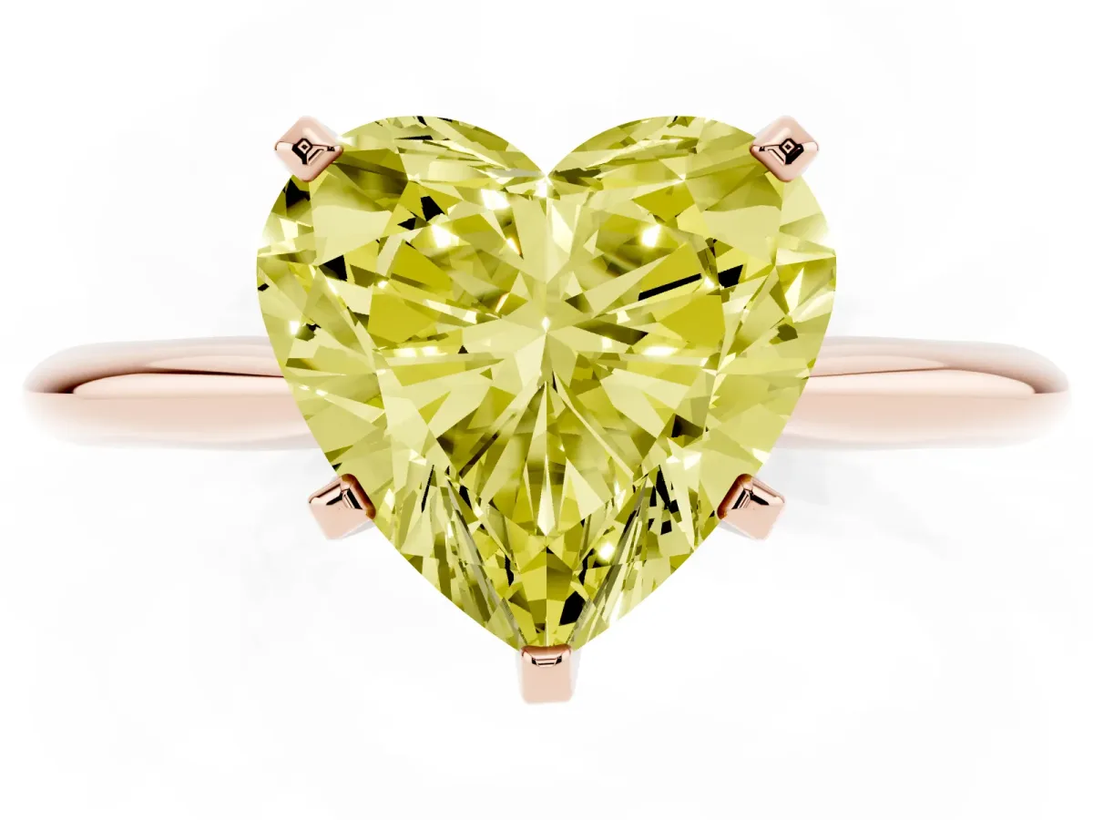 Fancy Yellow Heart Cut Cut Solitaire Ring with Four-Prong Setting on a Classic Band Rose gold