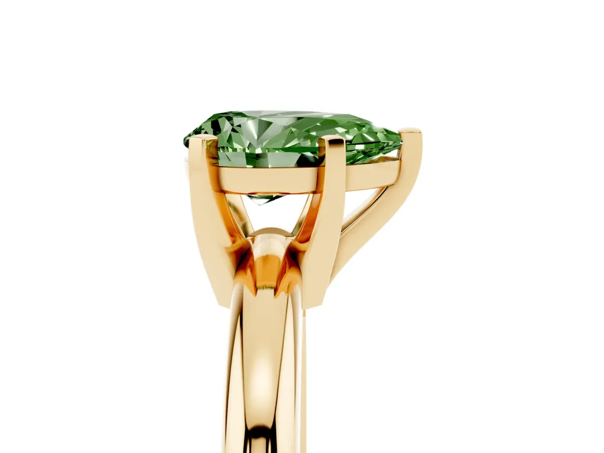 Fancy Green Pear Cut Diamond Solitaire Engagement Ring with Round Band and Four-Prong Setting Yellow gold