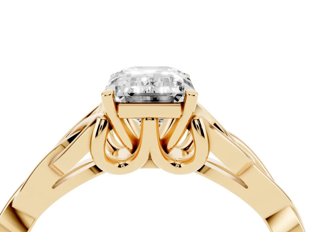 Emerald Cut Diamond Solitaire Engagement Ring with Celtic Knot Band and Four-Prong Setting Yellow gold