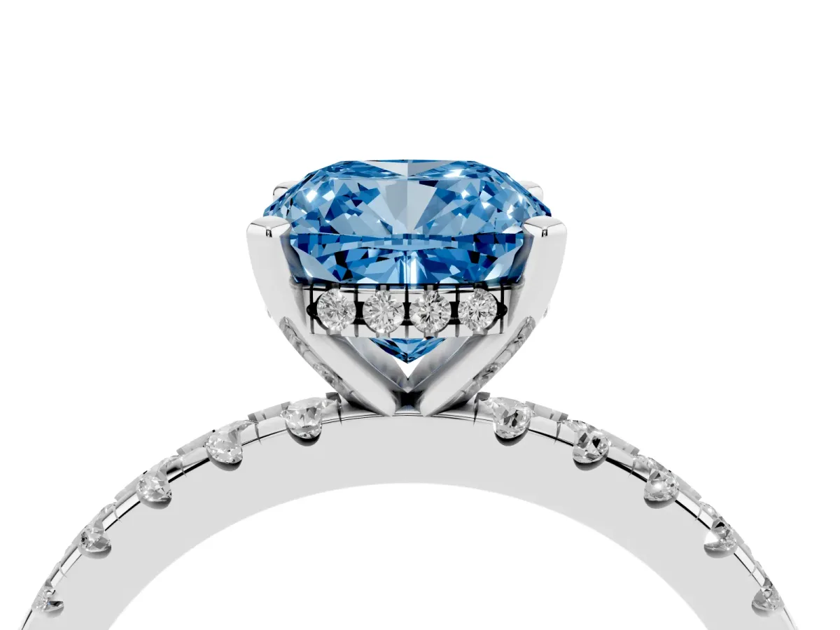 Fancy Blue Cushion Cut Diamond Solitaire Ring with Round Pavé Band and Four-Prong Setting Silver