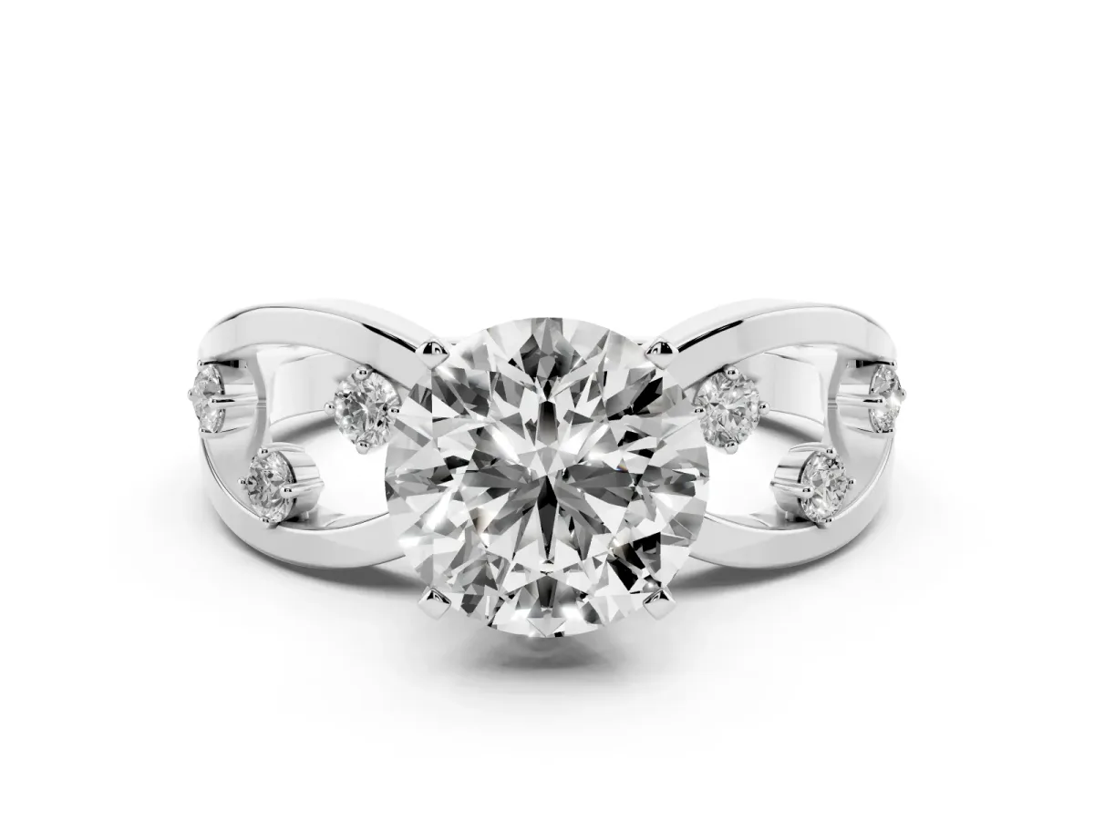 Round Cut Cut Solitaire Diamond with Side Stones on Criss-Cross Band and Four-Prong Setting Silver
