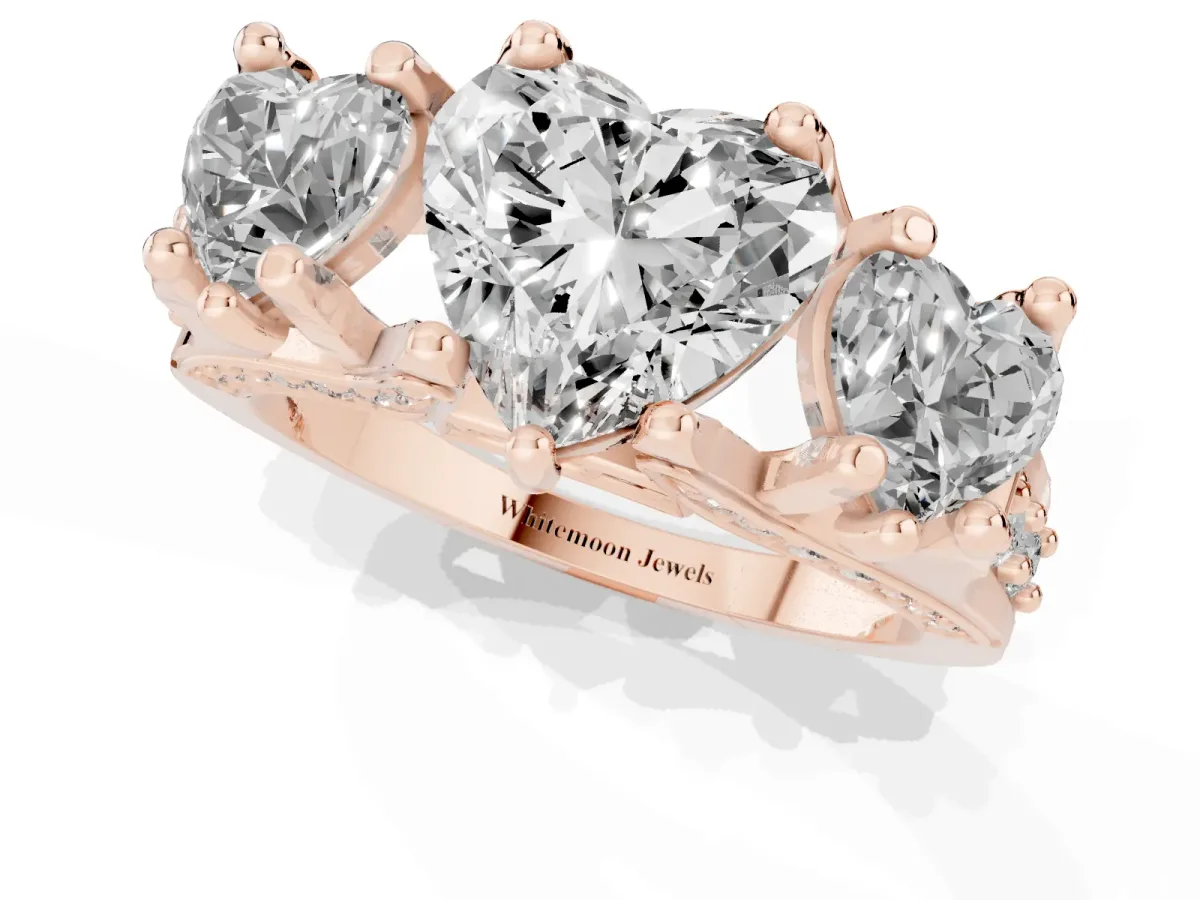 Heart Cut Diamond Three-Stone Ring with Channel Set Band and Four-Prong Setting Rose gold