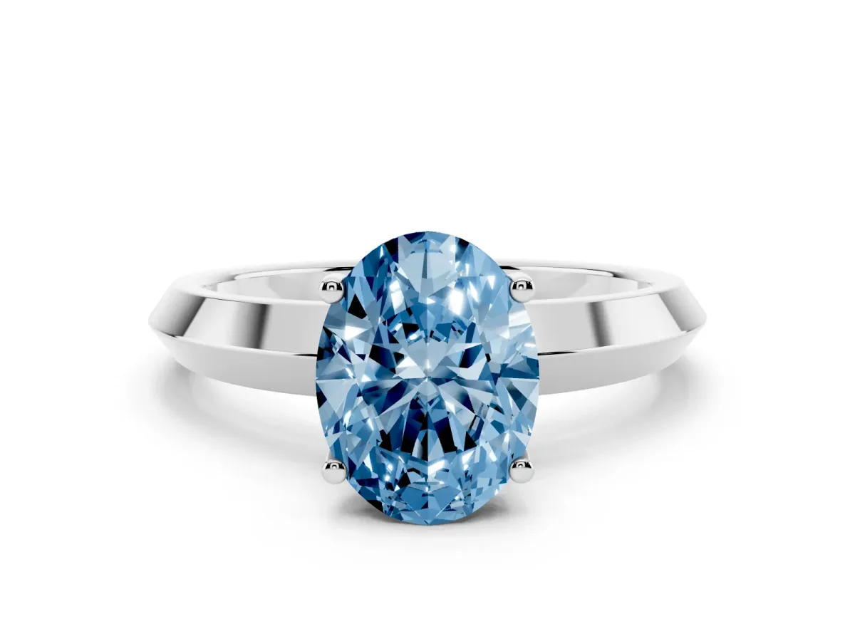 Fancy Blue Oval Cut Cut Solitaire Engagement Ring with Flat Band and Four-Prong Setting Platinum