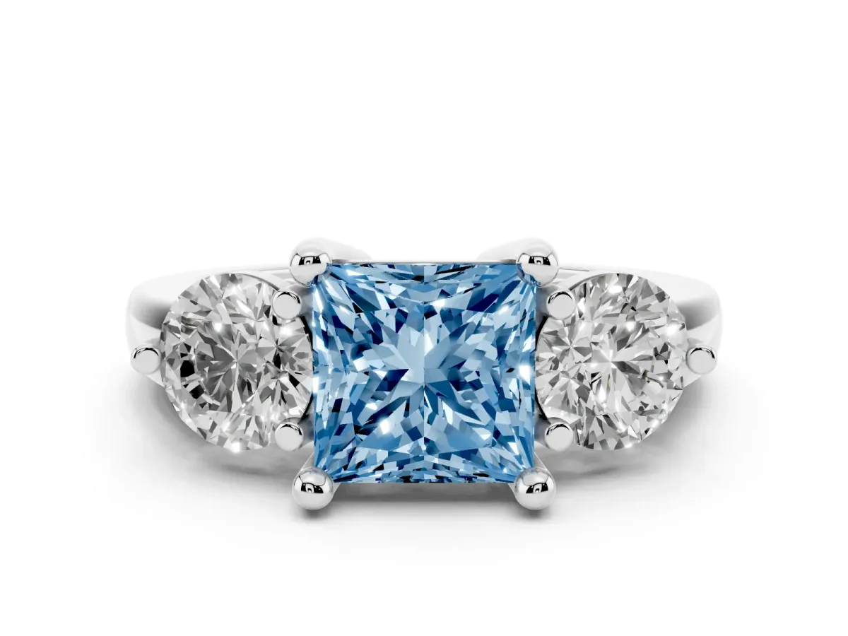 Fancy Blue Three-Stone Princess Cut Brilliant Cut Solitaire Ring with Prong Setting on a Classic Band Silver