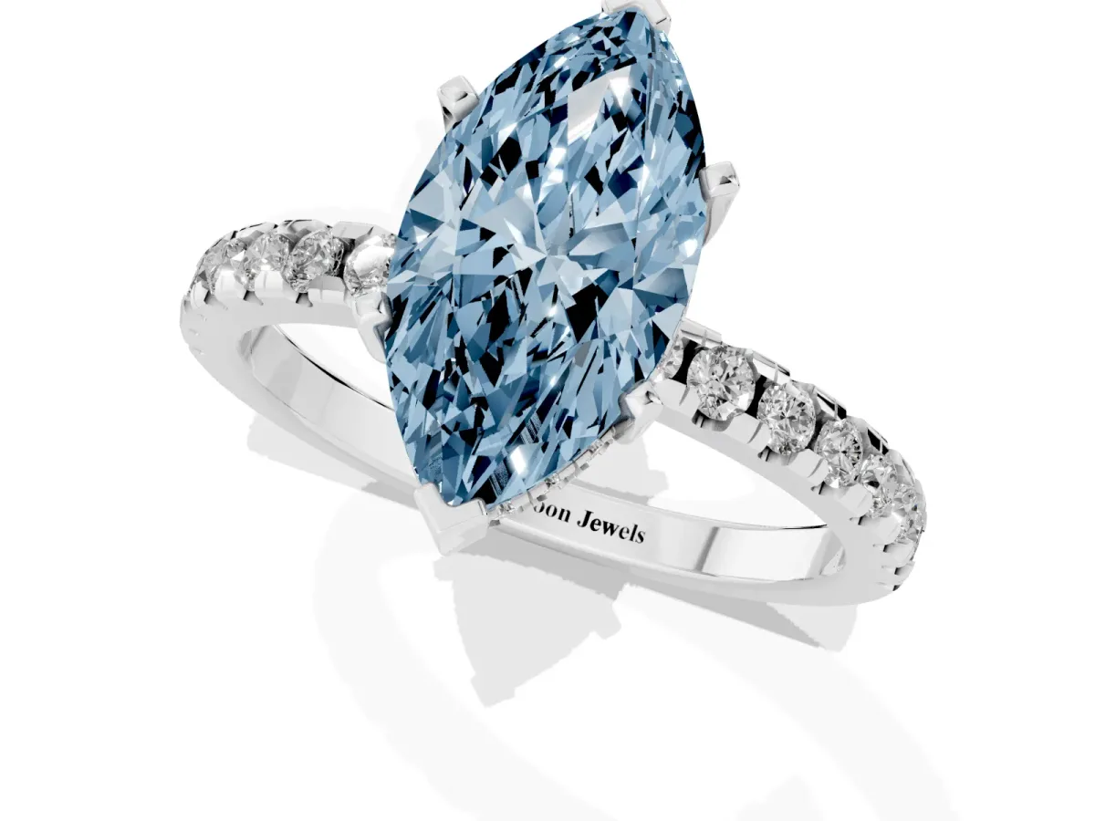 Fancy Blue Marquise Cut Diamond Solitaire Ring with Round Pavé Band and Four-Prong Setting Platinum