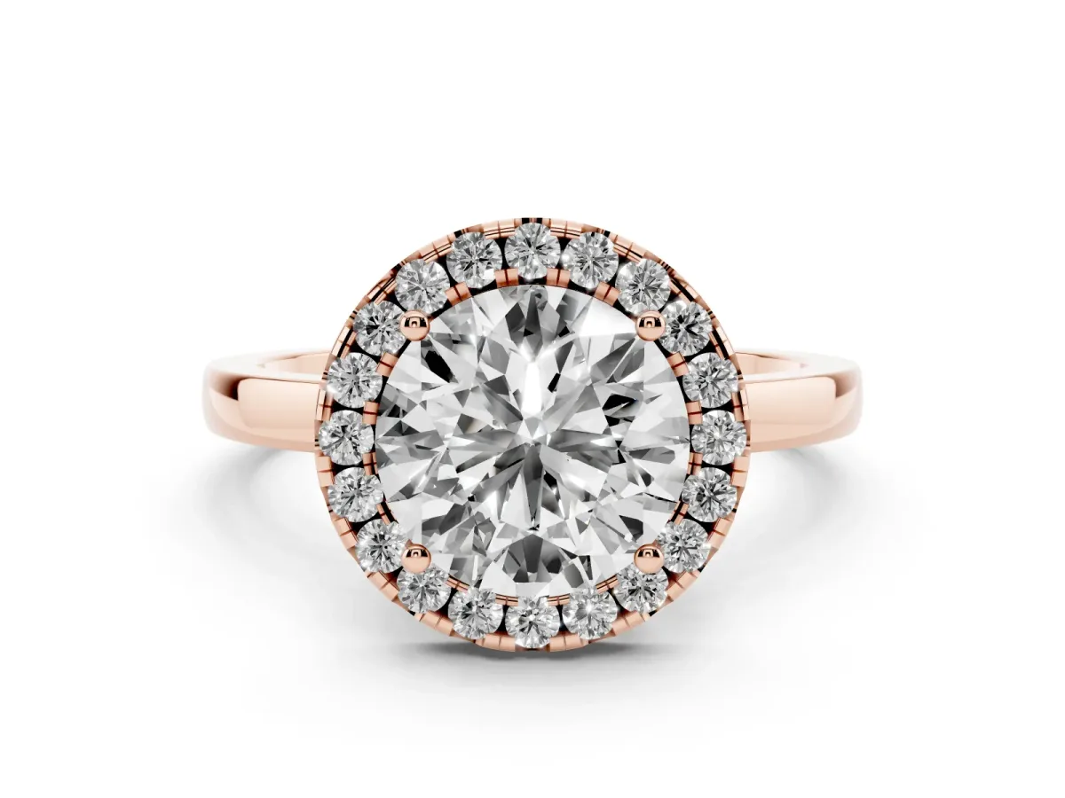 Round Cut Halo Diamond Solitaire with Pavé Band and Four-Prong Setting Rose gold