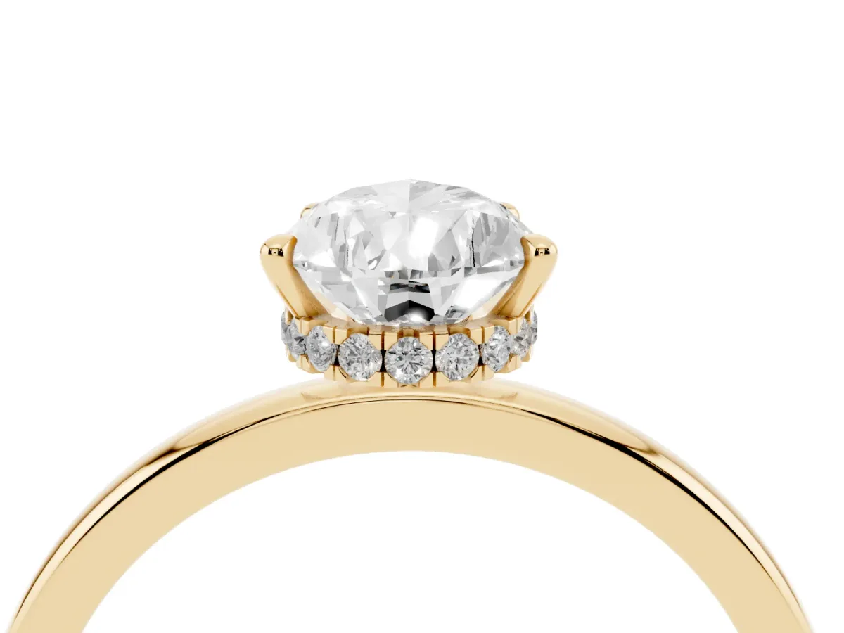 Pear Cut Solitaire Engagement Ring with Cathedral Band and Four-Prong Setting Yellow gold