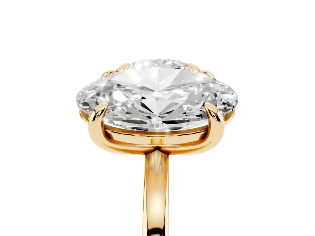 Round and Oval Toi Moi Ring with Prong Setting and Plain Band Yellow gold