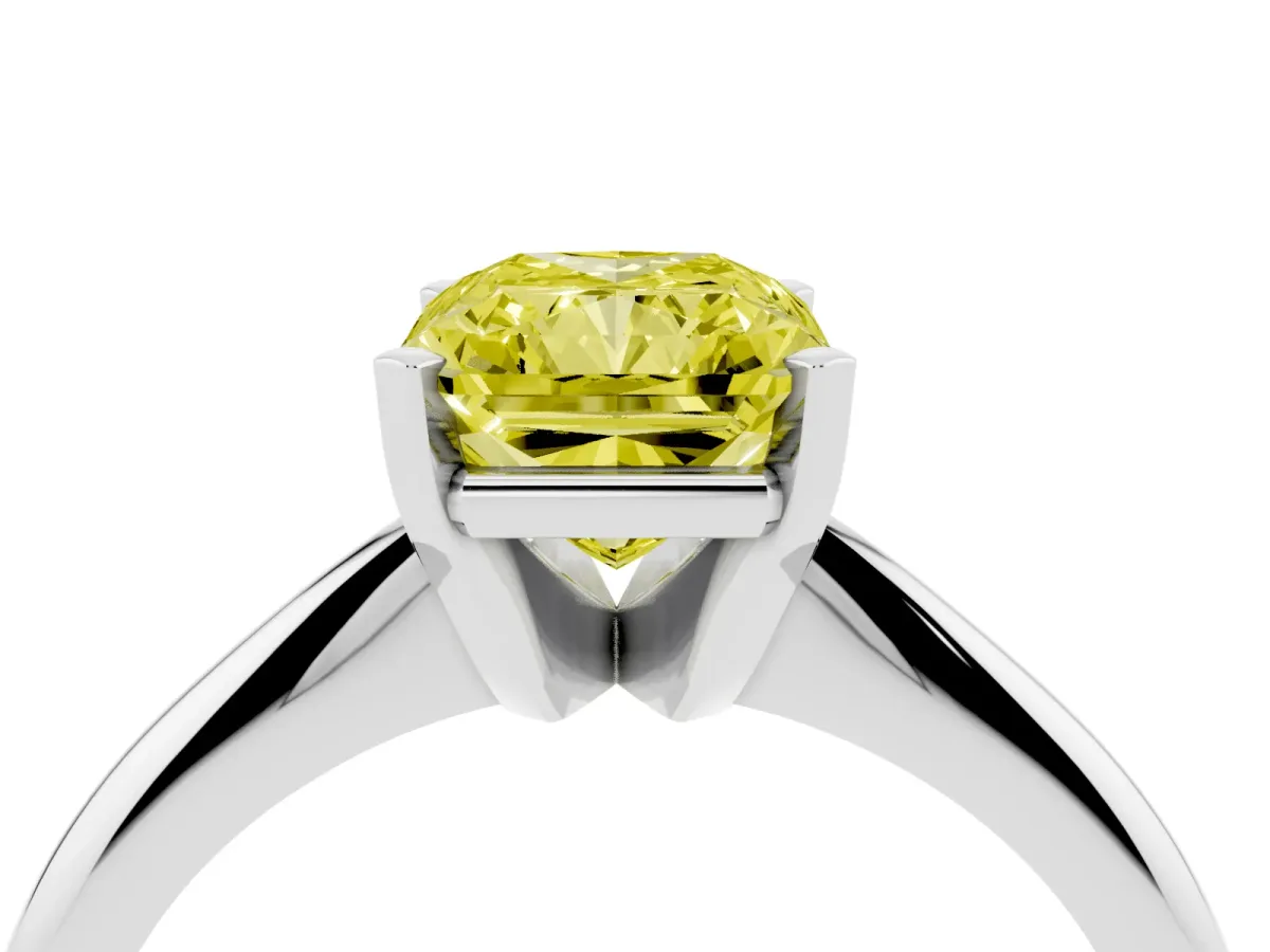 Fancy Yellow Radiant Cut Cut Solitaire Ring with Four-Prong Setting on a Classic Band Silver