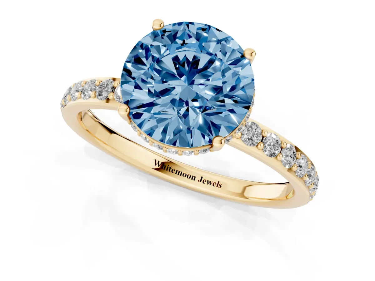 Fancy Blue Round Cut Diamond Solitaire Ring with Pavé Band and Hidden Halo Yellow gold
