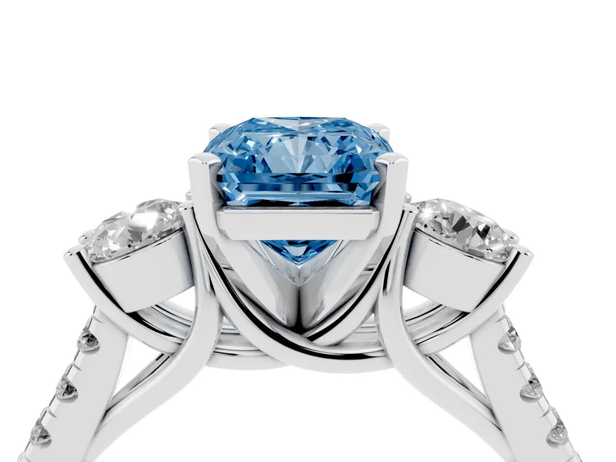 Fancy Blue Three-Stone Radiant Cut Diamond Pavé Band with Four-Prong Setting Platinum