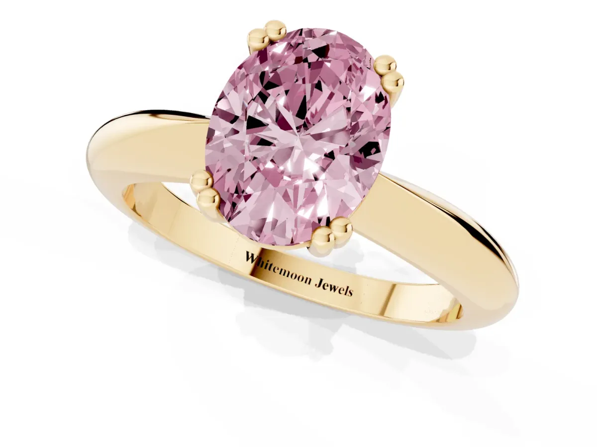Fancy Pink Oval Cut Cut Solitaire Engagement Ring with Tapered Band and Four-Prong Setting Yellow gold