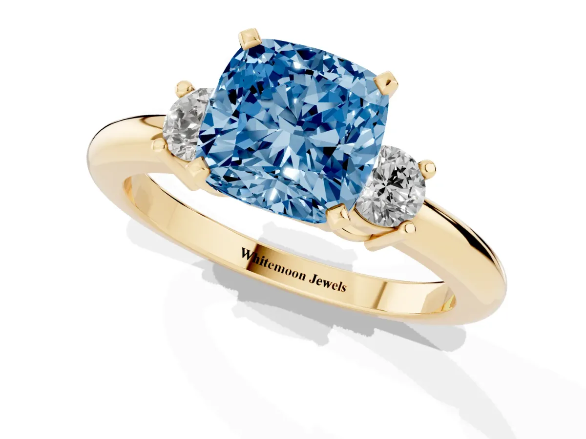Fancy Blue Three-Stone Cushion Cut Cut Diamond Solitaire with Prong Setting and Classic Band Yellow gold