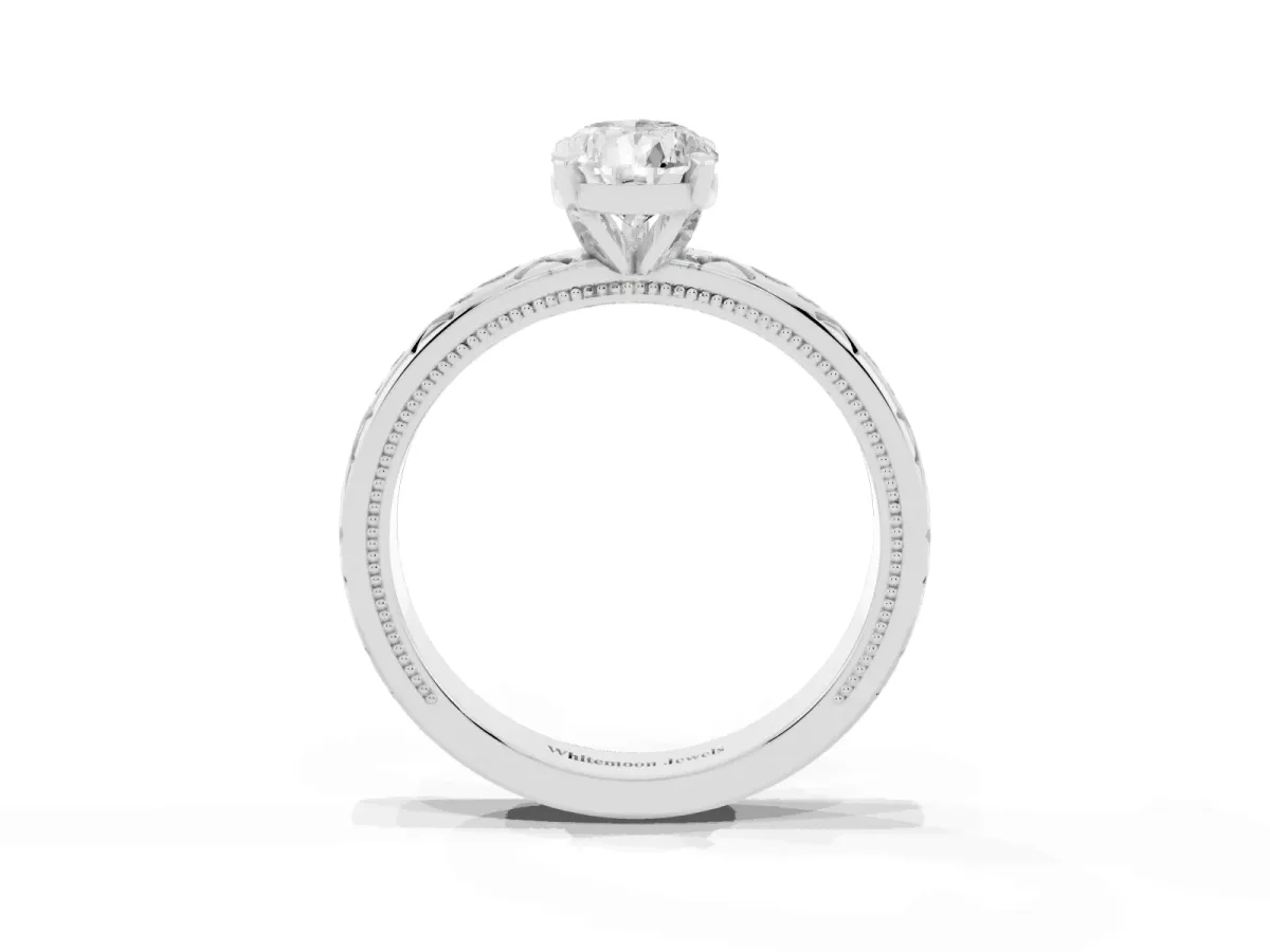 Pear Cut Solitaire Engagement Ring with Scrollwork Band and Four-Prong Setting White gold