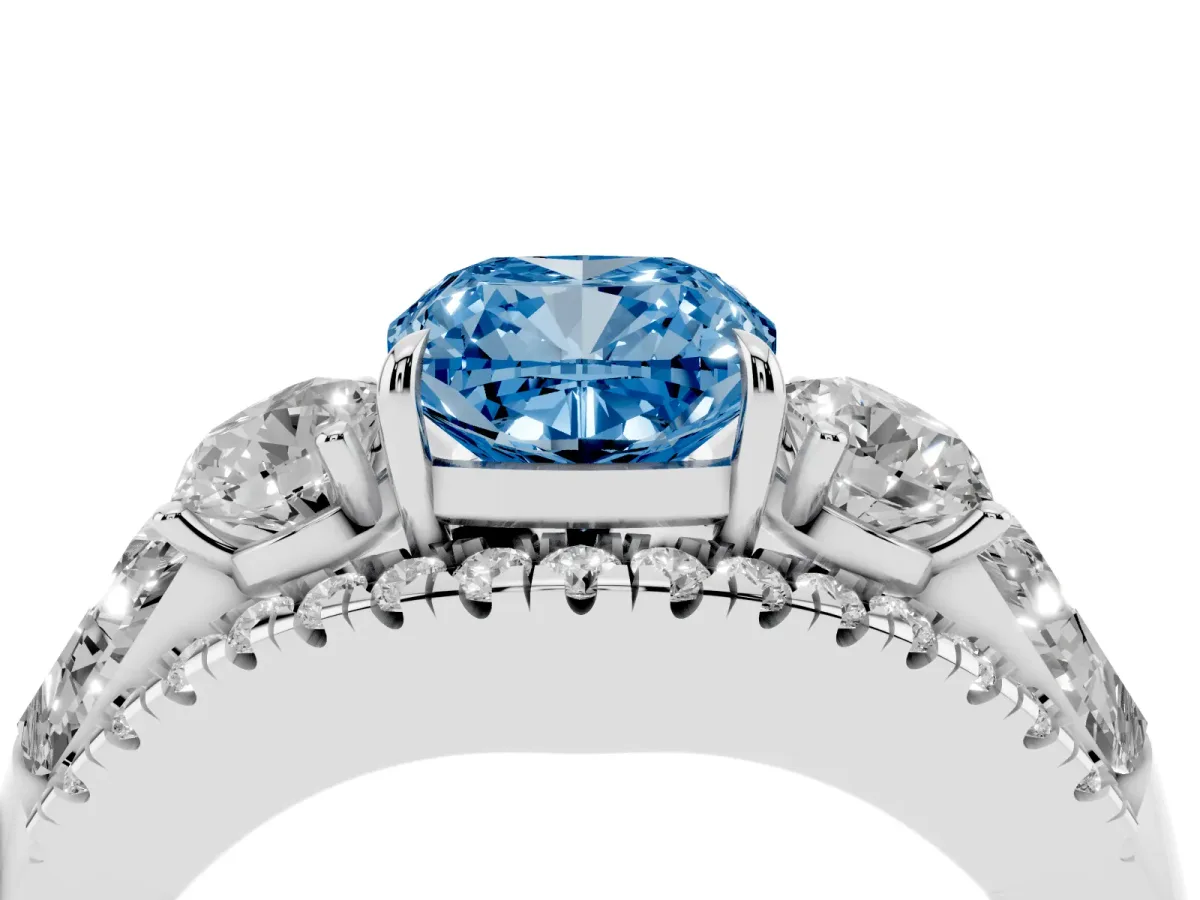 Fancy Blue Three-Stone Cushion Cut Diamond Engagement Ring with Pave Band and Prong Setting Platinum