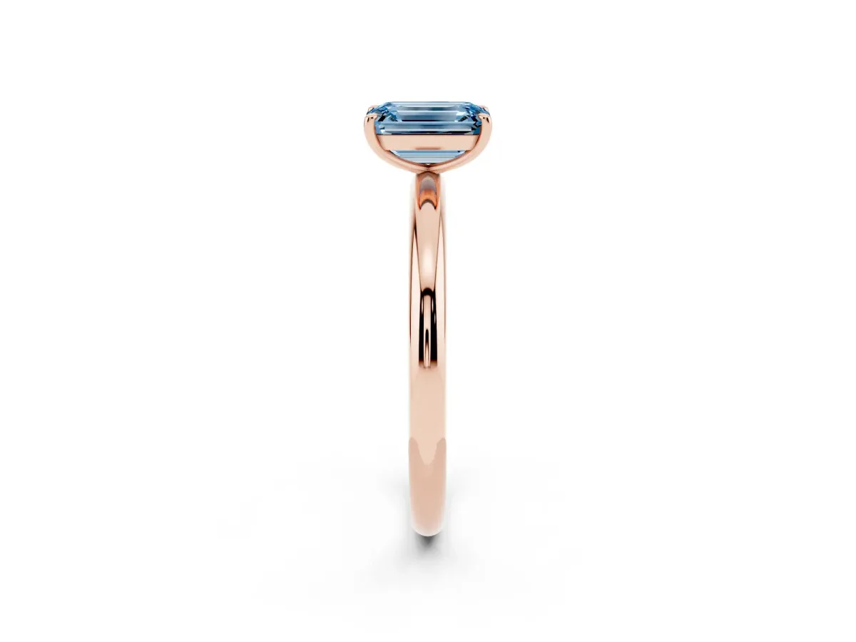 Fancy Blue Emerald Cut Solitaire Diamond Ring with Four-Prong Setting on a Plain Band Rose gold