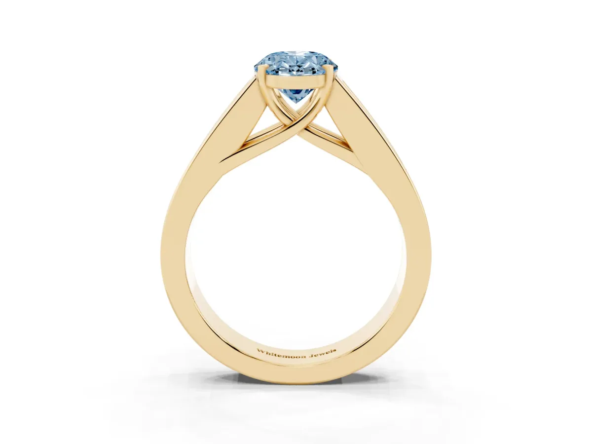 Fancy Blue Oval Cut Cut Channel Set Solitaire Ring with Four-Prong Setting Yellow gold