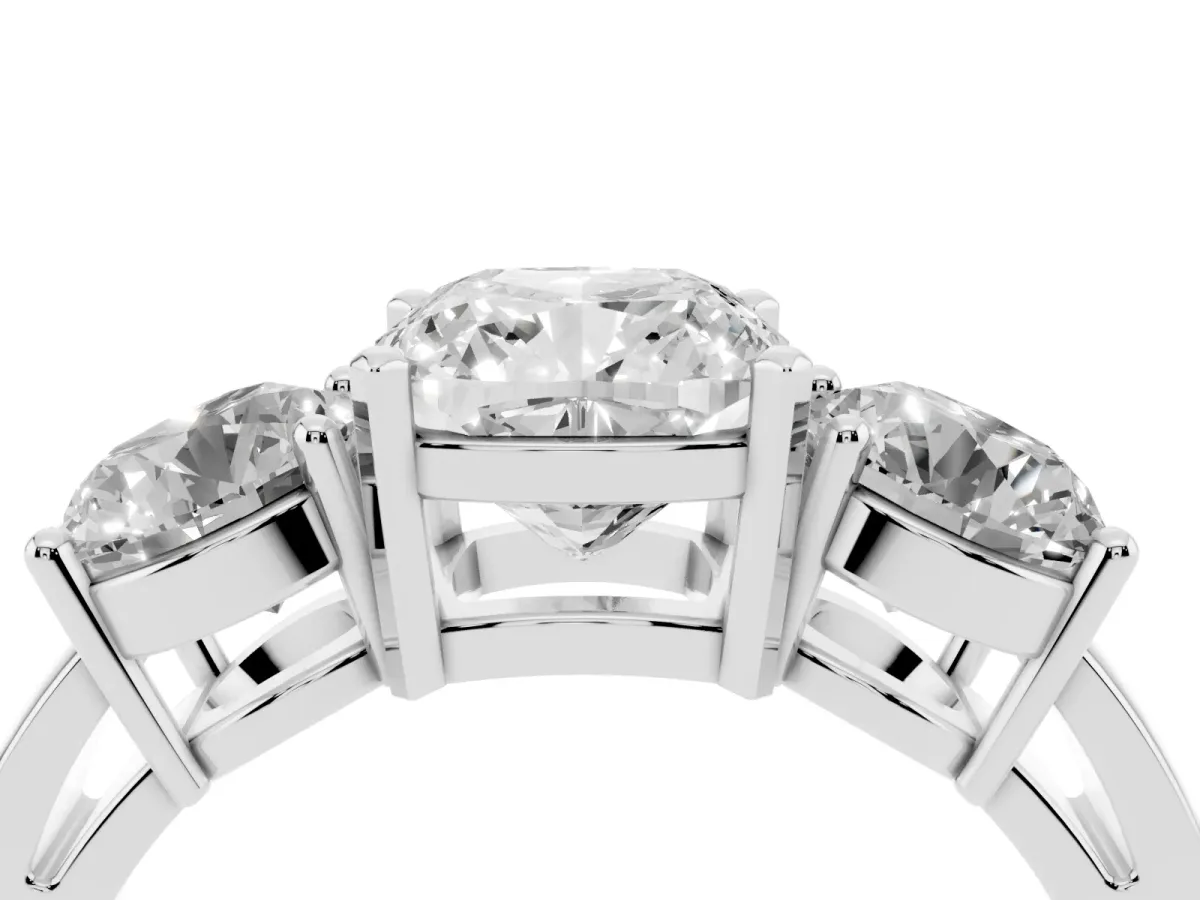 Three-Stone Cushion Cut Diamond Ring with Round Side Stones, Classic Band, and Four-Prong Setting Silver