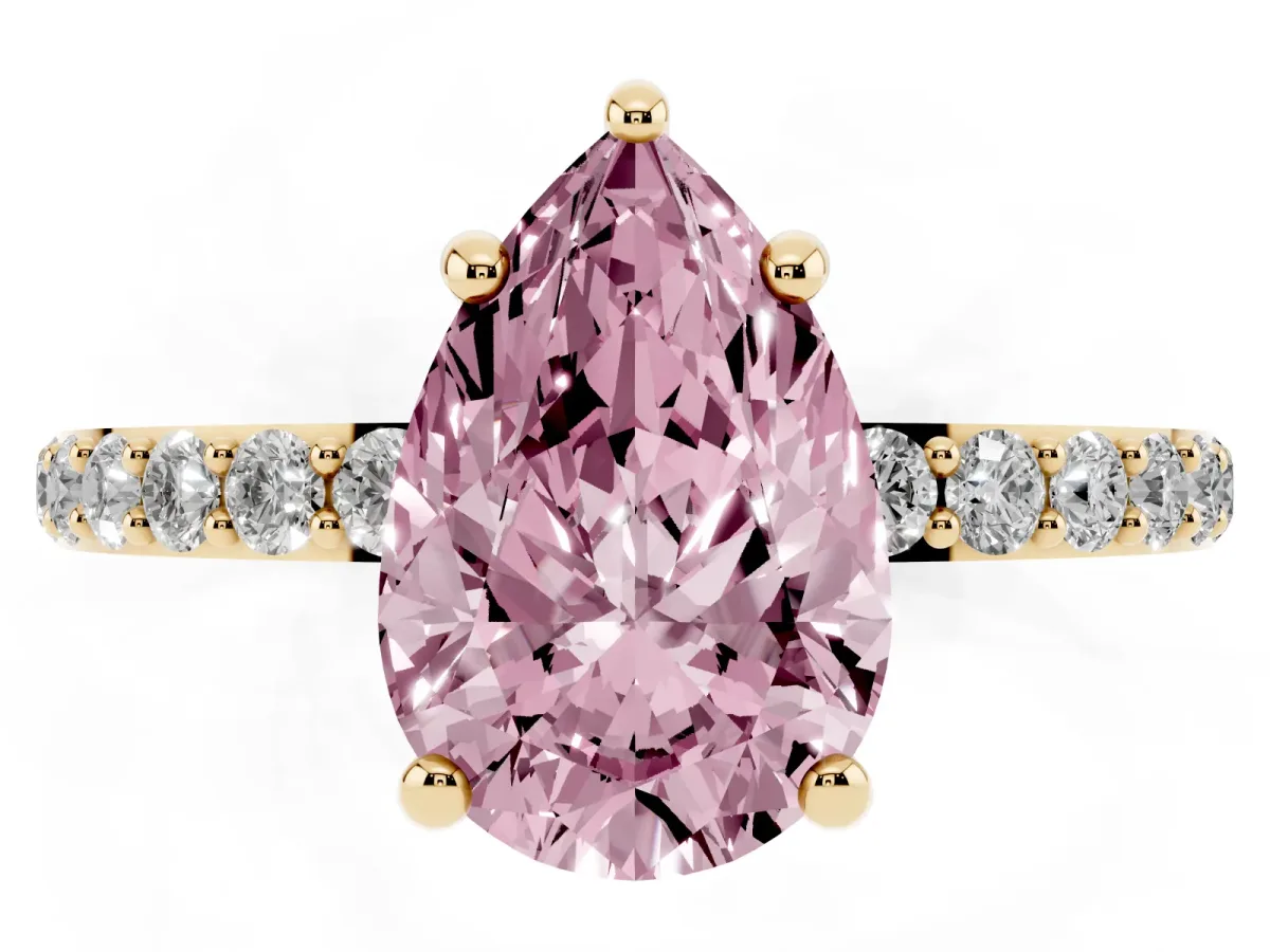 Fancy Pink Pear Cut Diamond Solitaire Ring with Round Pavé Band and Prong Setting Yellow gold