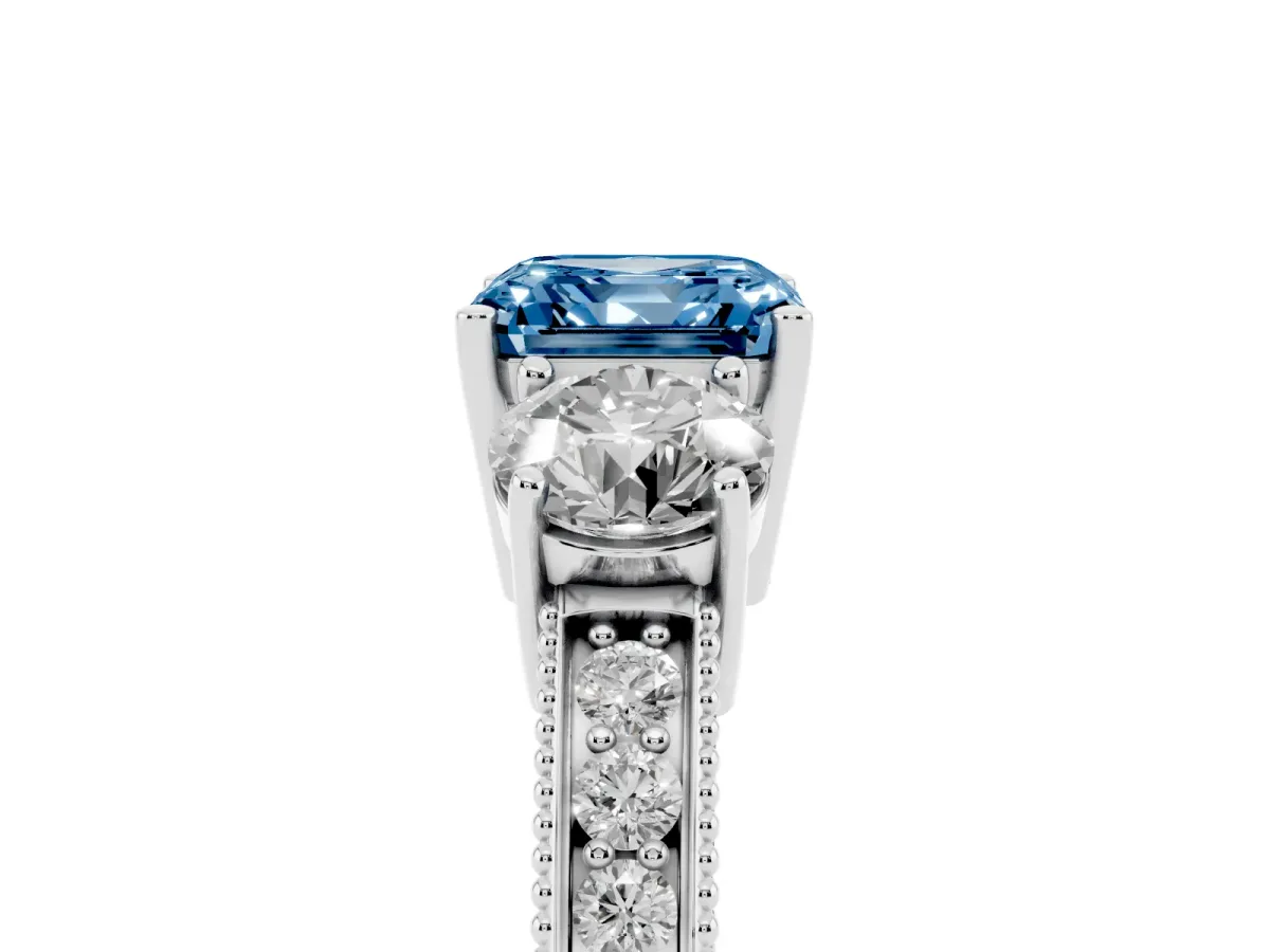 Fancy Blue Asscher Cut Three-Stone Diamond Ring with Pavé Band and Four-Prong Setting Silver