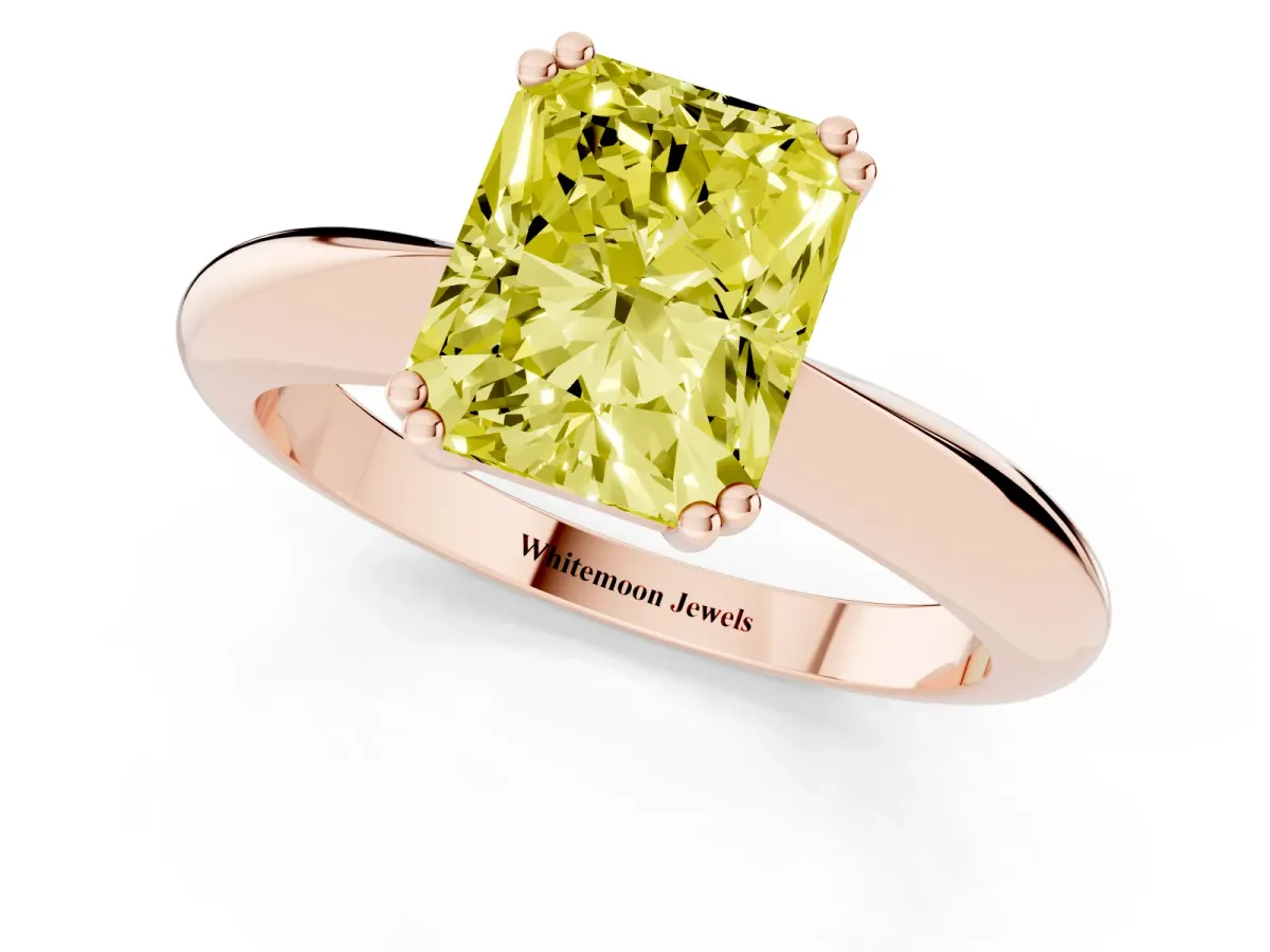 Fancy Yellow Radiant Cut Cut Solitaire Engagement Ring with Tapered Band and Four-Prong Setting Rose gold