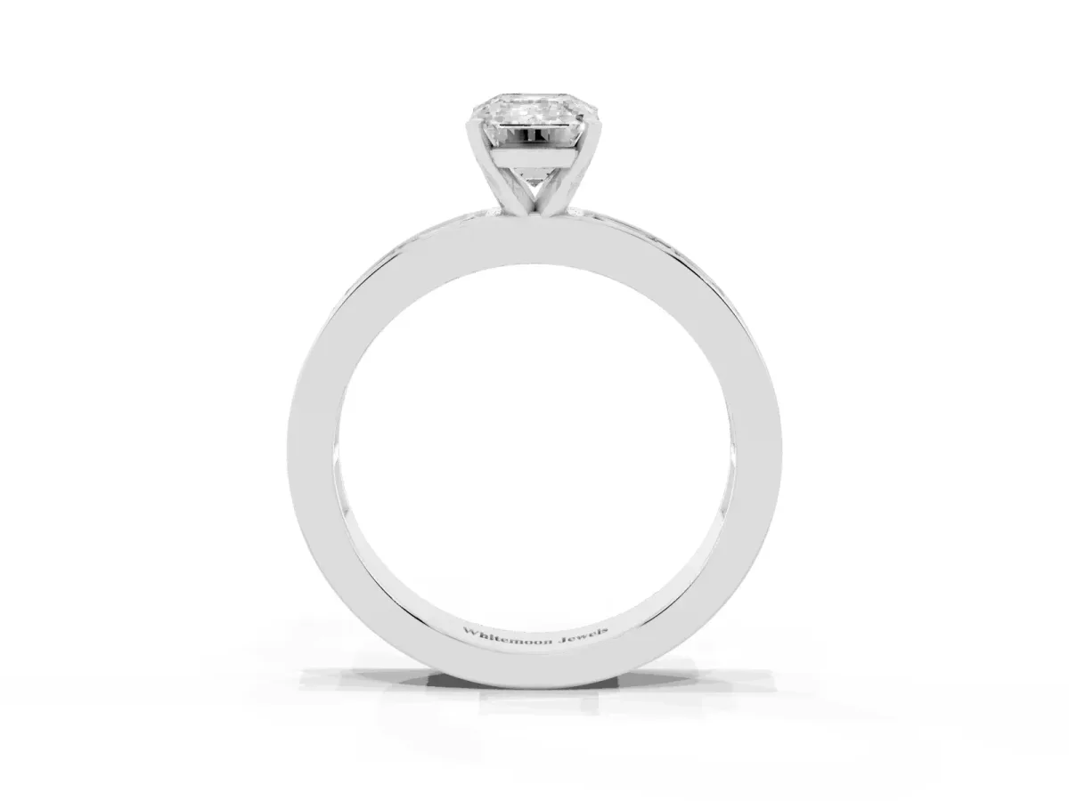 Emerald Cut Solitaire Diamond Ring with Channel-Set Baguette Band and Four-Prong Setting Silver